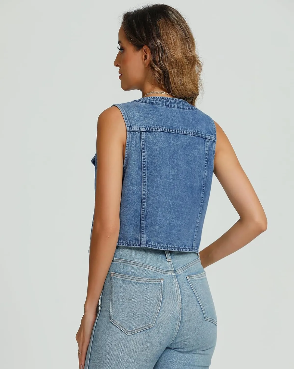 Kedera Women's V Neck Denim Vest Asymmetrical Hem Sleeveless Button Front Jean Vests Crop Tops with Pockets