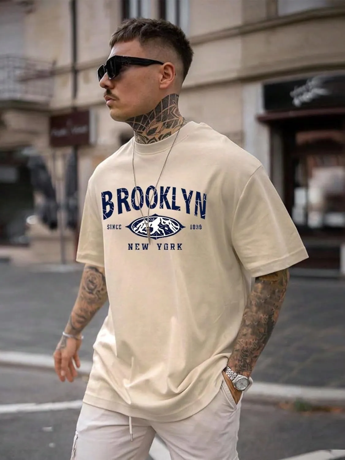 SweatyRocks Men's Letter Graphic Tee Short Sleeve Round Neck Drop Shoulder Top T-Shirt