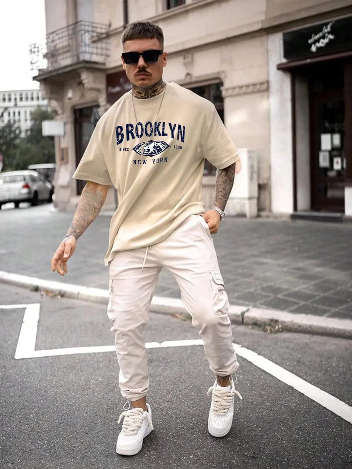 SweatyRocks Men's Letter Graphic Tee Short Sleeve Round Neck Drop Shoulder Top T-Shirt
